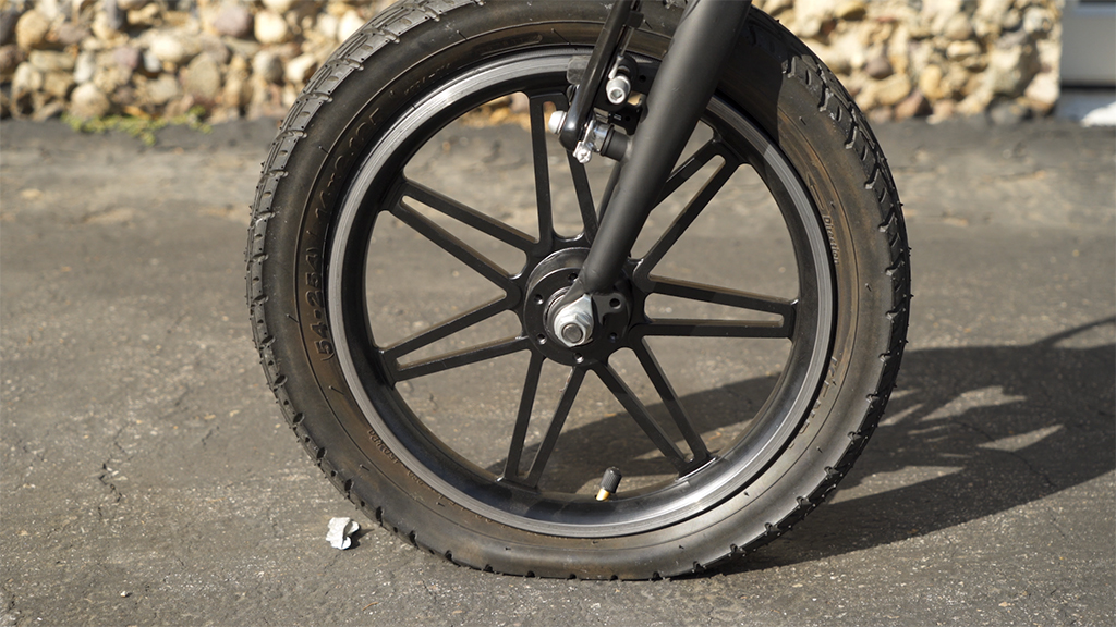 Close-up of the EB5 Pro front tire with low tire pressure