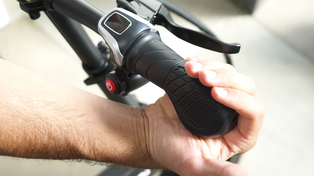 Close-up of someone adjusting the twist throttle.