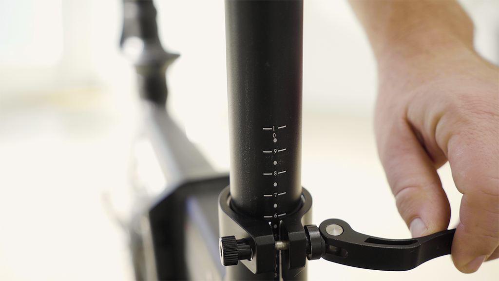 Close-up of the EB5 Pro seat post clamp and safety markings