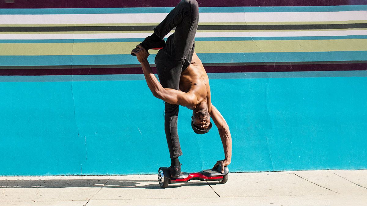 Cyberyoga with an advanced yoga handstand pose on the T580 Vibe